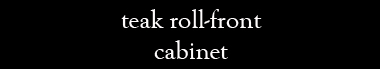 teak roll-front cabinet